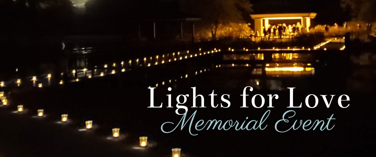 hundreds of luminaries lighting a path to a gazebo lit with luminaries at night